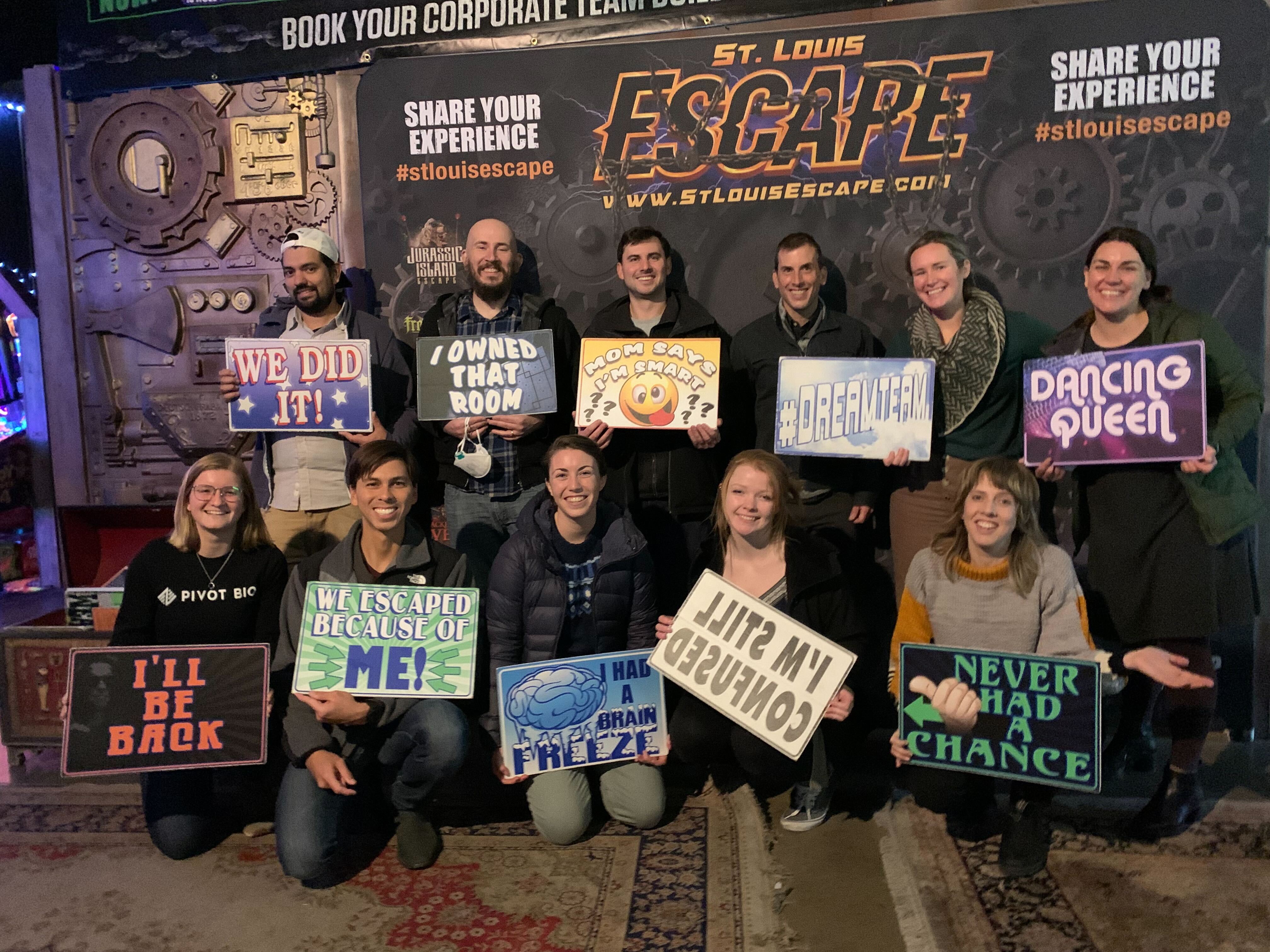 Maddi King poses for a group photo with coworkers after going through an escape room