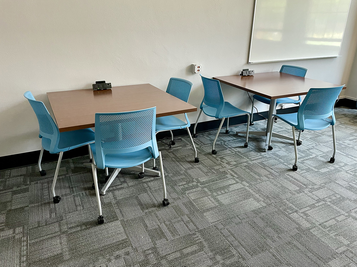Updated furniture, fresh paint and new lighting and carpet in the BAE building student loung.